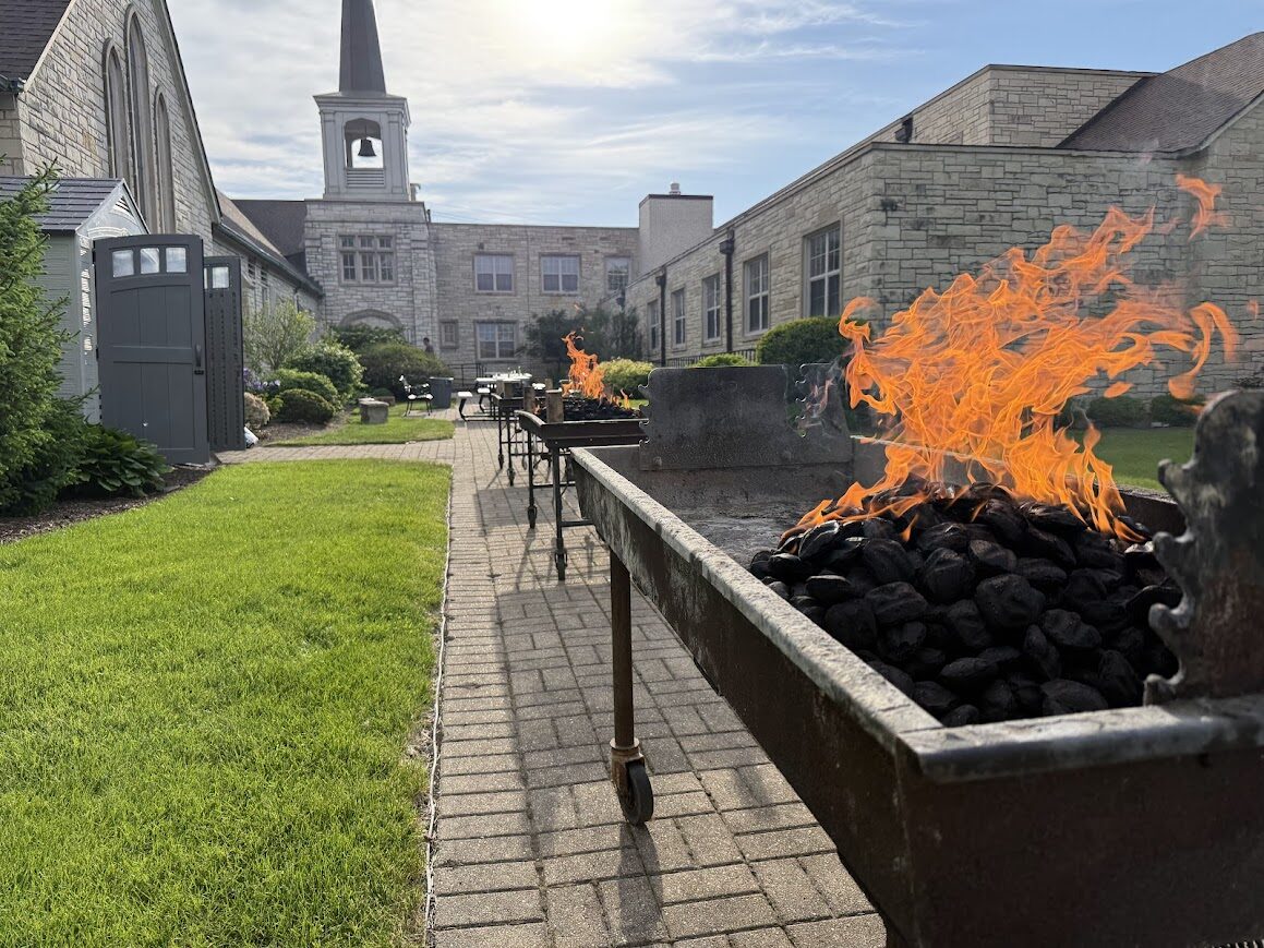 Grills firing in the Trinity courtyard